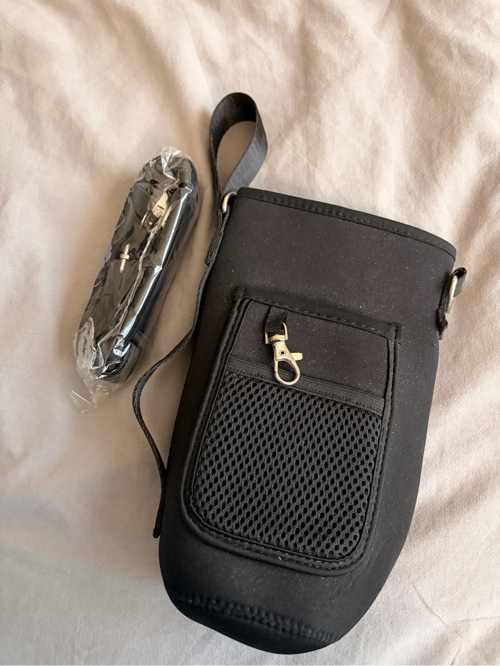 Black Crossbody Bottle Bag with Front Pocket